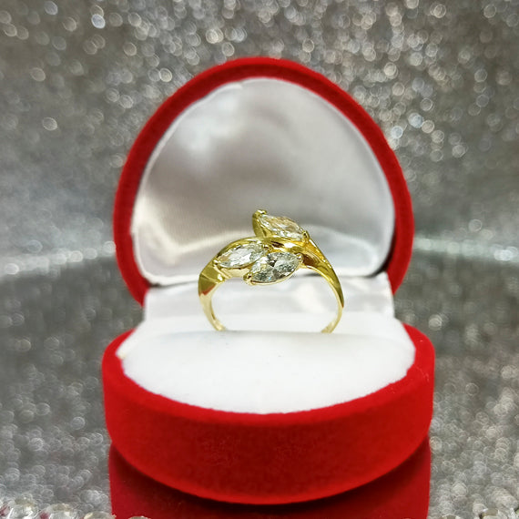 Złoty pierścionek liść z kamieniami