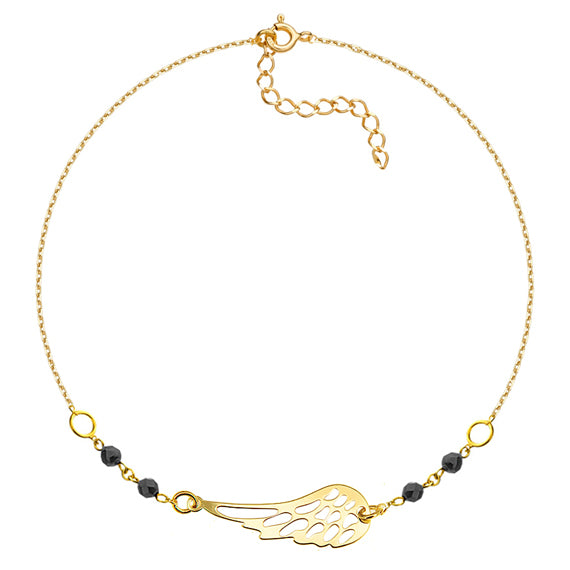 Złota bransoletka ze skrzydłem i koralikami