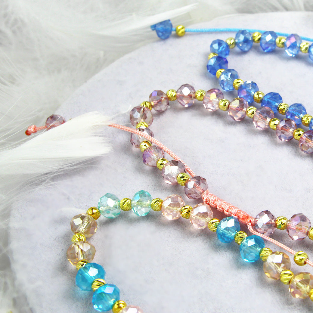 Bransoletka z koralikami - pastelowy róż i złote kulki