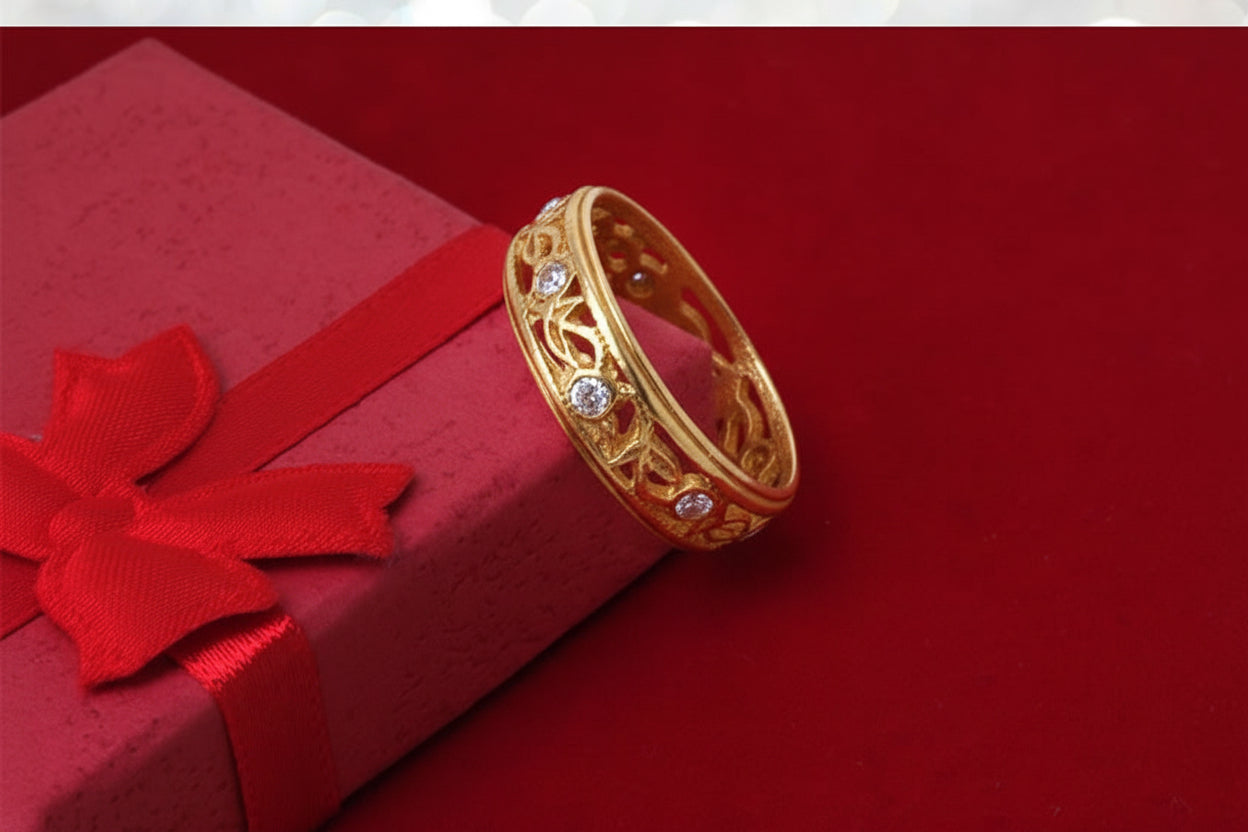 Ażurowa obrączka z cyrkoniami