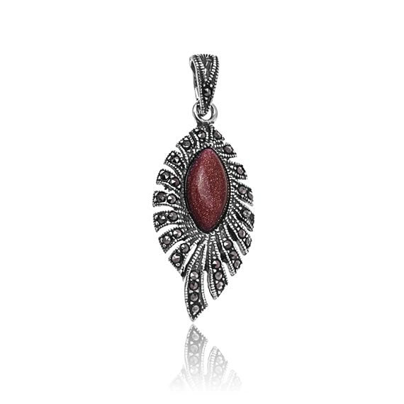 Wisiorek z markazytami i piaskiem pustyni