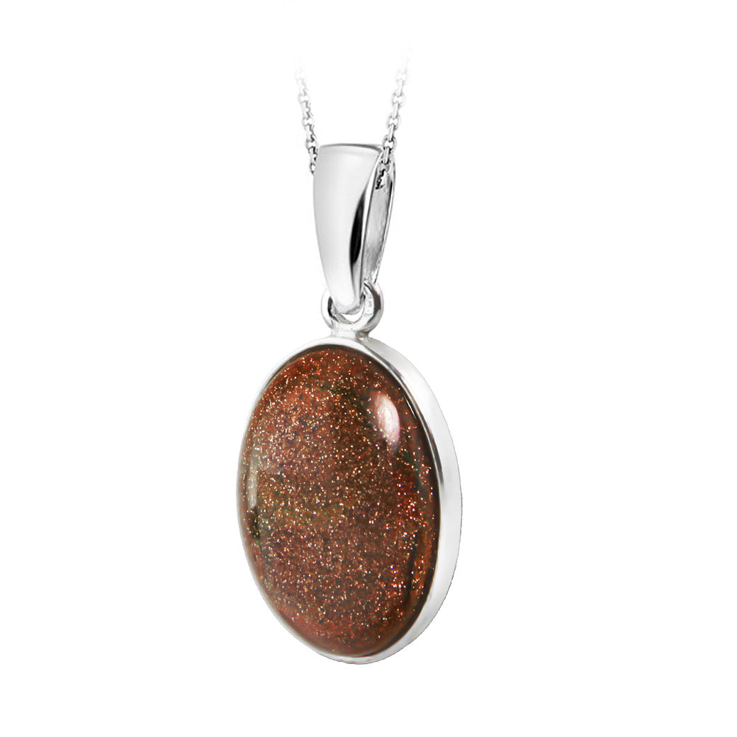 Owalny wisiorek z piaskiem pustyni 18x12mm Elegancka Alicja