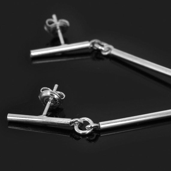 Srebrne wiszące kolczyki sztywne rurki