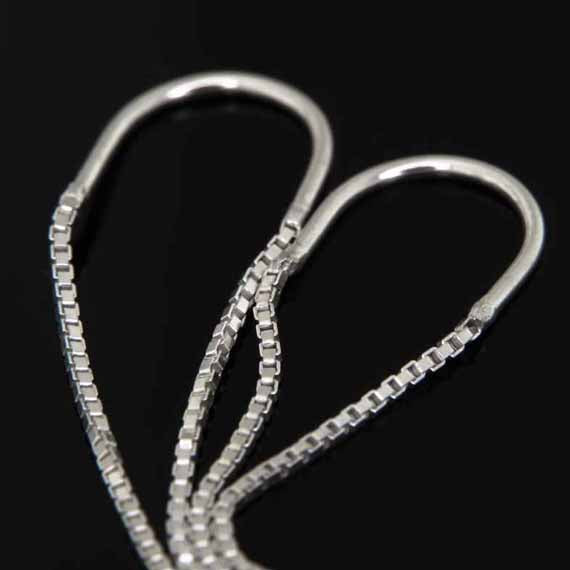 Podwójne przekładane kolczyki krzyżyki