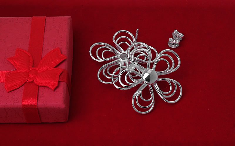 Duże oryginalne kolczyki kwiaty