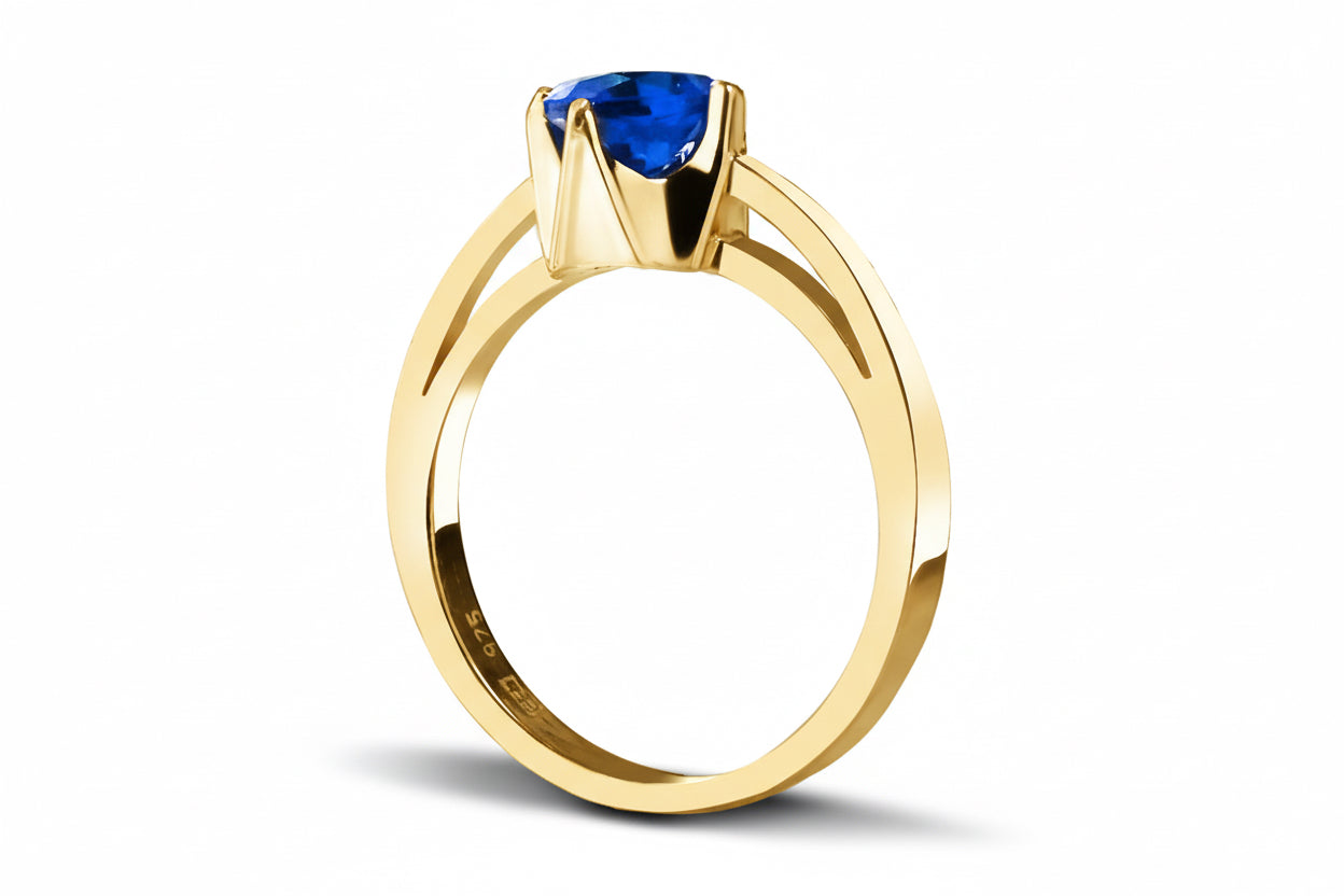 Pierścionek z wysoką koroną szafirowa cyrkonia srebro pozłacane