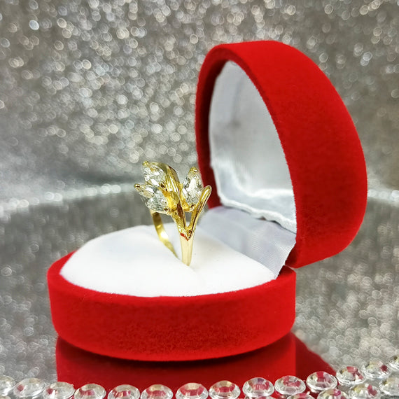 Złoty pierścionek liść z kamieniami