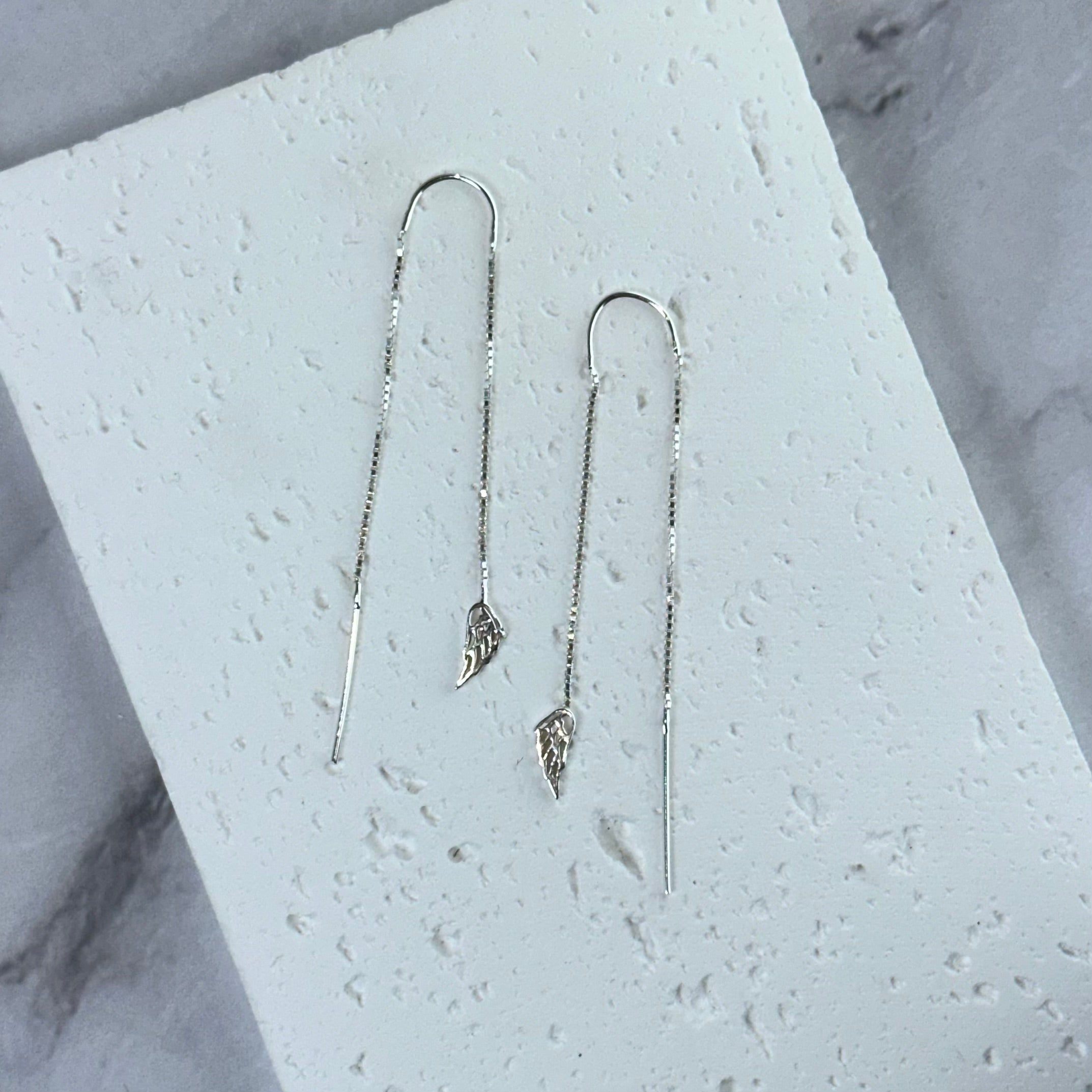 Kolczyki przewlekane podwójne ze skrzydłami